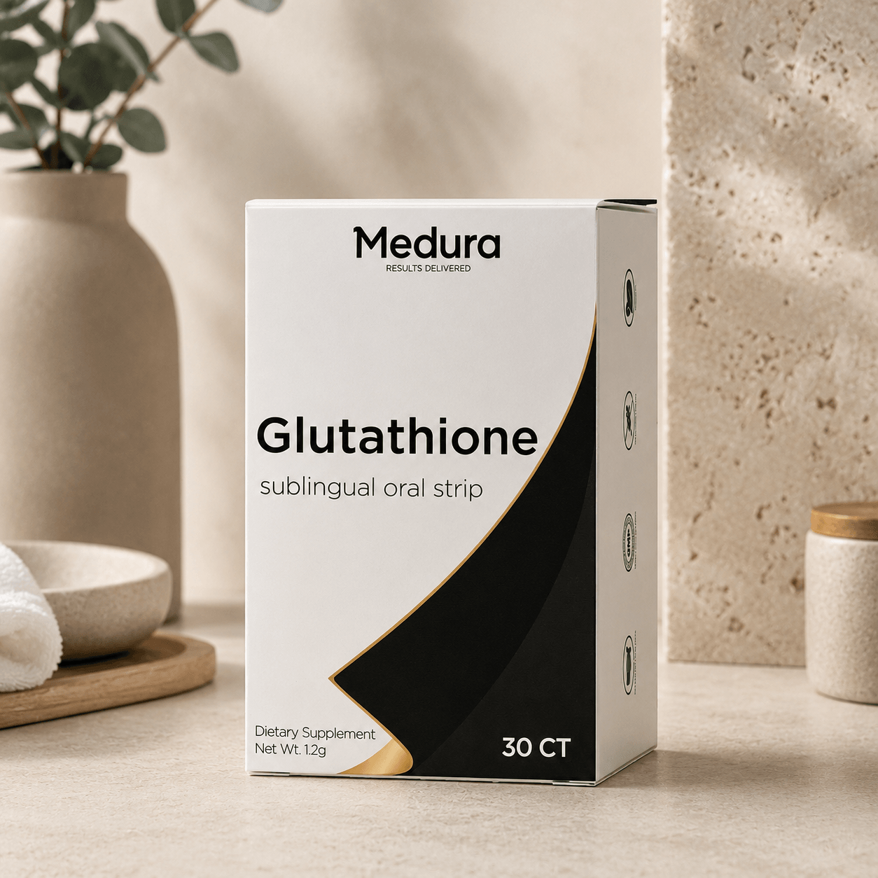 Medura Glutathione sublingual oral strip box in a warm lifestyle setting with eucalyptus and stone surface